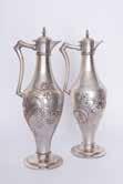 Ezüst kiöntő párban Silver jugs in pair Osztràk- magyar, 1867-1937 közötti fèmjel, 800 ezrelékes ezüst, KA