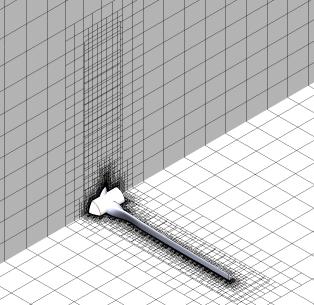 A tér felbontására téglatest hálót készítettünk, amit a test közelében határréteg hálózással sűrítettünk. Az egyik konfigurációhoz kapott véges térfogat háló a következő ábrán látható.