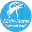 24 Körös Maros Nemzeti Park Hosszú lábú, hosszú nyakú madarak lépegetnek az úton, fiatal túzokok követik gondozójukat a Körös Maros Nemzeti Parkban.