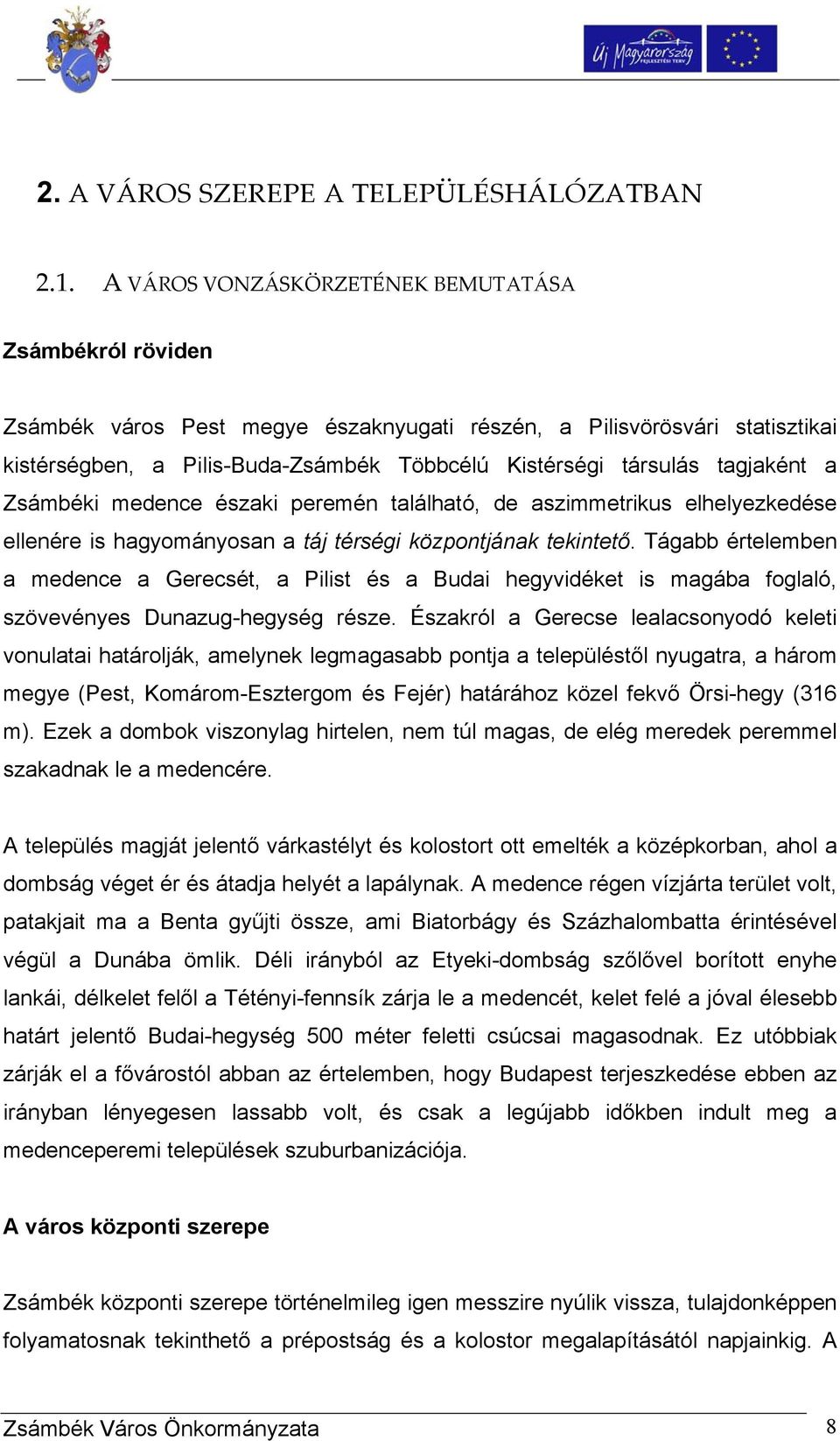 tagjaként a Zsámbéki medence északi peremén található, de aszimmetrikus elhelyezkedése ellenére is hagyományosan a táj térségi központjának tekintető.