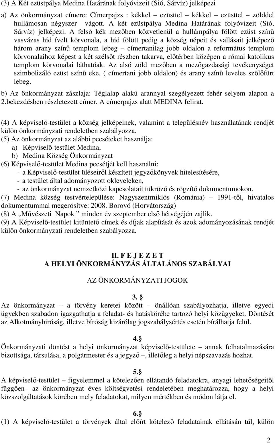 A felső kék mezőben közvetlenül a hullámpálya fölött ezüst színű vasvázas híd ívelt körvonala, a híd fölött pedig a község népeit és vallásait jelképező három arany színű templom lebeg címertanilag