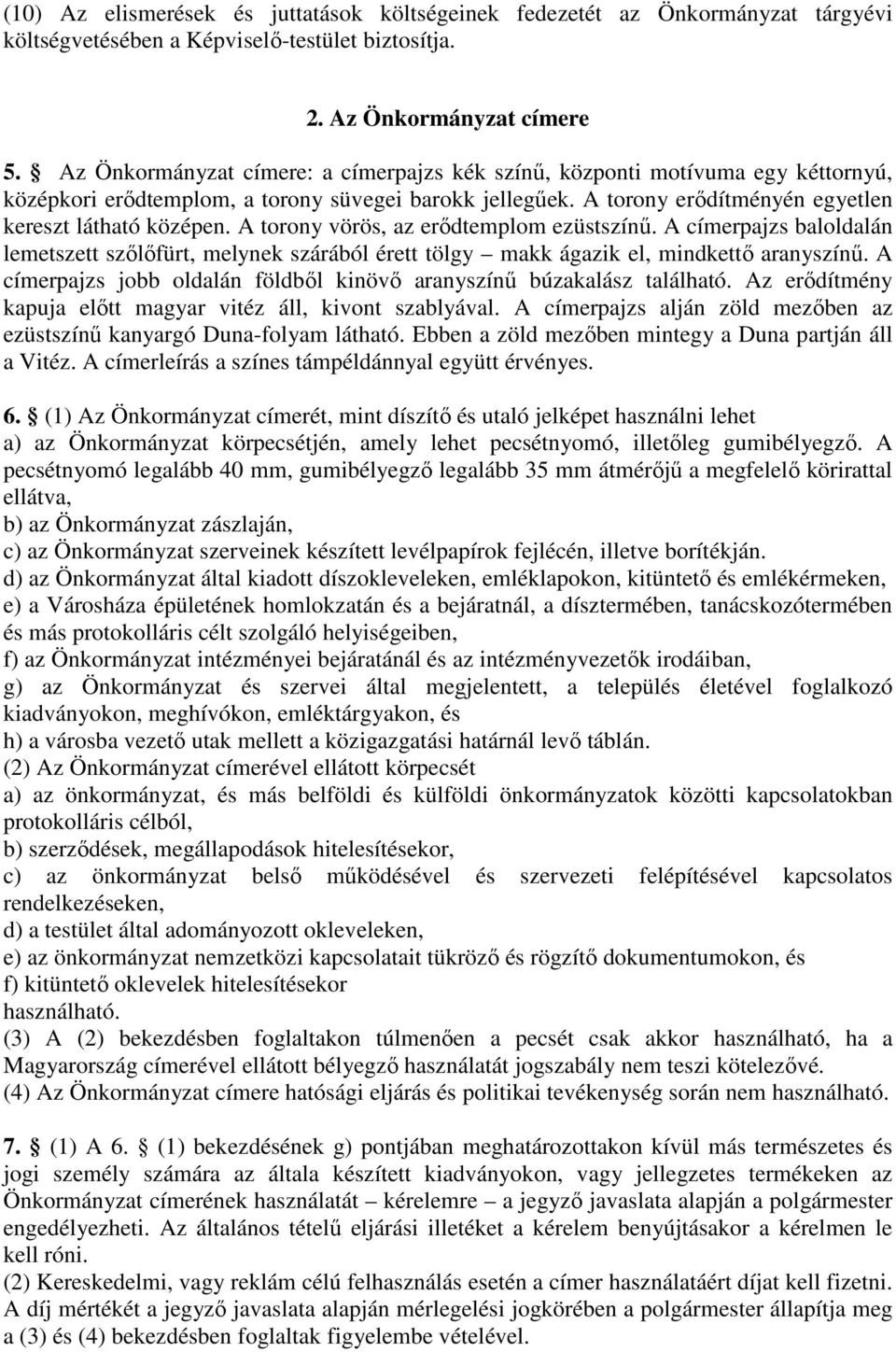 A torony vörös, az erődtemplom ezüstszínű. A címerpajzs baloldalán lemetszett szőlőfürt, melynek szárából érett tölgy makk ágazik el, mindkettő aranyszínű.