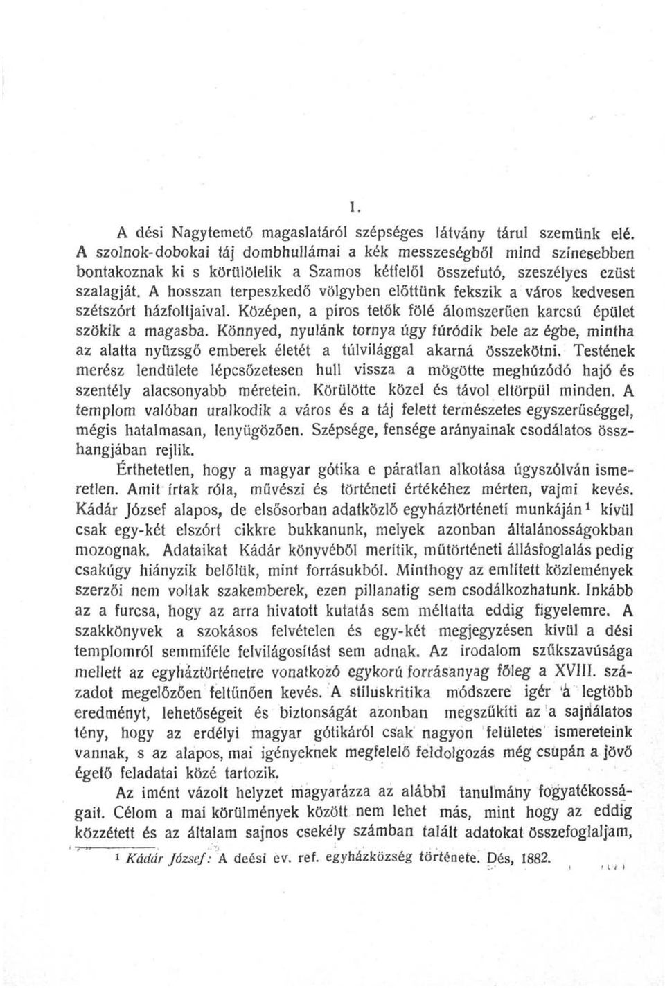 A hosszan terpeszkedő völgyben előttünk fekszik a város kedvesen szétszórt házfoltjaival. Középen, a piros tetők fölé álomszerűén karcsú épület szökik a magasba.