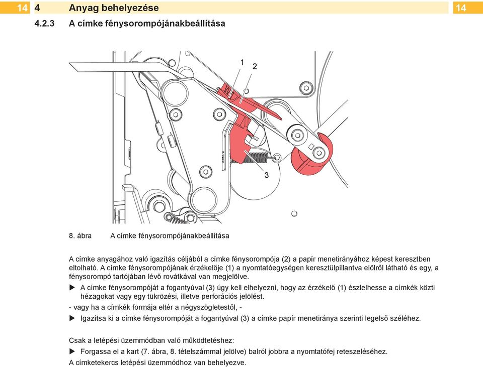 A címke fénysorompójának érzékelője (1) a nyomtatóegységen keresztülpillantva elölről látható és egy, a fénysorompó tartójában lévő rovátkával van megjelölve.