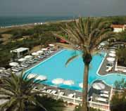 MARINA Club Hotel (3*Sup) Tengerparti szálloda dús mediterrán parkban. Több épület egység, medence, napozóterasz. Központ kb. 2 km. Strand: a szálloda előtt, mely a parkján keresztül közelíthető meg.
