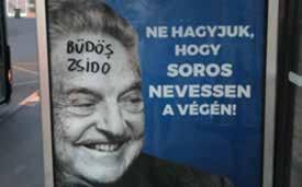 A zsidó bankár, aki tönkretette Angliát, aki a népek zsírján hízik, aki aláássa a nemzetek szuverenitását, most a magyar nemzet életére tör. Hazugságon alapuló nyílt antiszemita propaganda = fasizmus.
