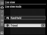 Tripod (Állvány) mód (h) 1 Készüljön elő a fényképezéshez. Helyezze a fényképezőgépet állványra, vagy ennek hiányában stabil, sík felületre.