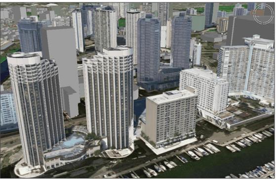A bal képen egy GeoMedia-ban létrehozott 3D-város modellje látható, a jobb képen a programban az épületek importáltak.