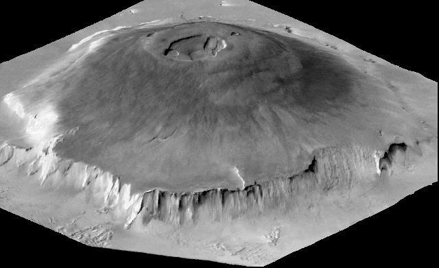 A Mars hatalmas kanyonrendszere a Valles Marineris. Tőle jobbra két óriásvulkán látható. (NASA/Viking.) A Tharsis magaslat egy kb. 5000 kilométer átmérőjű fennsík.