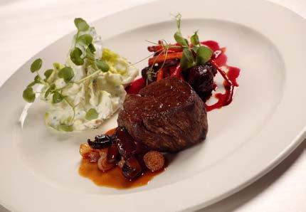 MAIN COURSES / FŐÉTELEK Aged Beef steak served with caramelized rout vegetables and fried potato Érlelt