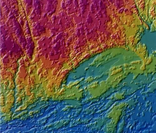A Sudbury Magmás Komplexum regionális földtani helyzete, gazdasági jelentősége Meteorit krátert kitöltő több kilométer vastag magmás