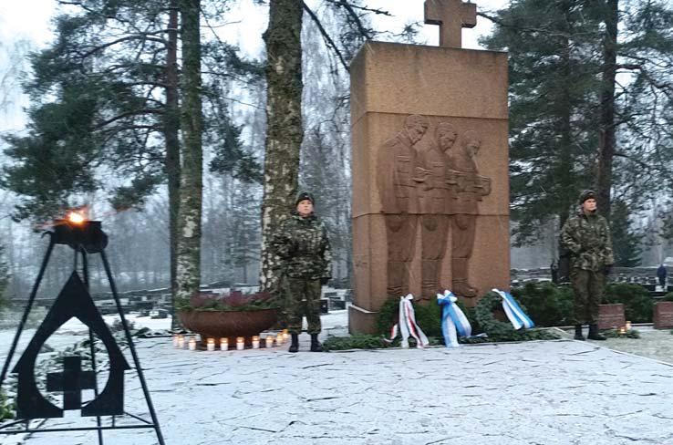 közgyűlés elnöke és Juha Parianen, a haminai evangélikus gyülekezet megbízott igazgató esperese.