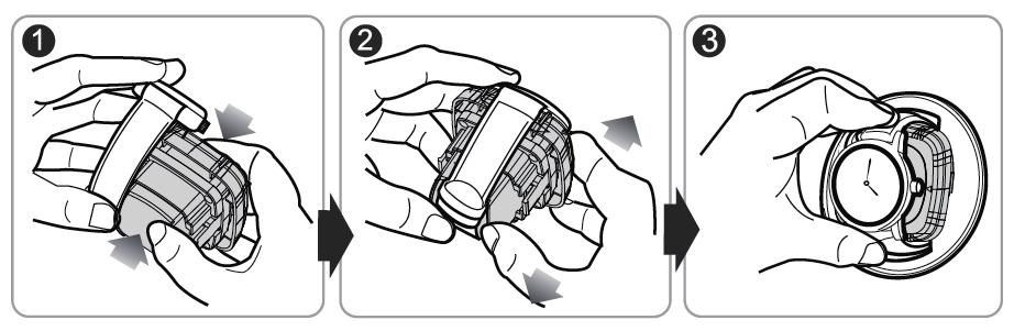 2 Nyissa ki az elülső borítót, használja a mutató- és a hüvelykujját, hogy az órák részére az alátétet az alátét mindkét oldalán kilazítsa (nézze meg a nyíl jelzését). Húzza ki az alátétet.