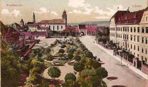 Park na Klubertovom námestí, stav v 1. - 2. dekáde 20. storočia pred radnicou osadená fontána (okrasná studňa) podľa návrhu Ing. Ladislava Steinhausza s bronzovou sochou Dobročinnosť.