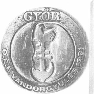 Győri vándorgyűlés 87 4-770 E: Felül a szélen vízszintesen GYŐR, baloldalt középről indulva lefelé a szélen körben O.E.E. VÁNDORGYŰLÉS 1981 felirat.