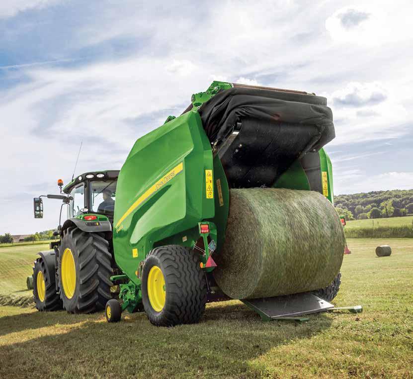 John Deere V401R prémium bálázók INTELLIGENS FUNKCIÓK TRAKTOR-BÁLÁZÓ AUTOMATIZÁLT KAPCSOLAT AZ AUTOMATIKUS ÜZEMELTETÉSHEZ EGYEDÜLÁLLÓ, LEENGEDHETŐ PADLÓS ELTÖMŐDÉS-MENTESÍTŐ RENDSZER KIEMELKEDŐ