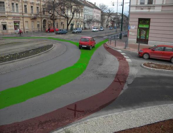89. ábra A kerékpárosok átvezetésének biztonságos (zöld) és balesetveszélyes (piros) nyomvonala körforgalomban 30 Ez a megoldás minden egysávos körforgalom esetén alkalmazandó, akkor is, ha a