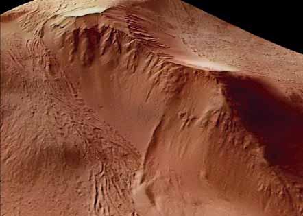 NEUKUM Hatalmas méretû, jégtartalmú törmeléklejtô a Marson, amely fejlôdése során kitöltötte meredek hegyoldalakkal körülvett képzôdési területét, s annak peremén átbukva benyomult egy alacsonyabb