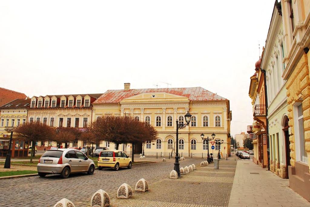 Pohľad č. 19 pohľad zo severnej časti Hlavného námestia južným smerom na r. k. kostol sv.