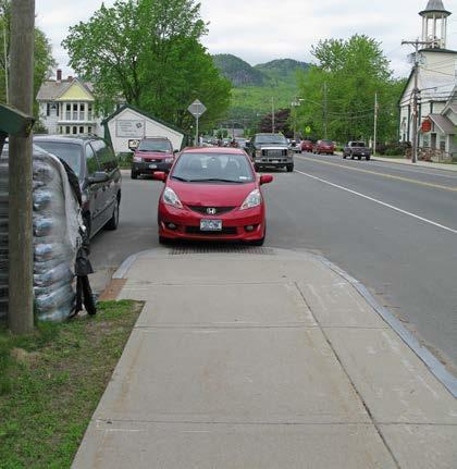 Moderate High # of Curb Cuts: 1 Residential 5 Non-residential Density of Curb Cuts: 41 per mile Notes: Many pedestrians are crossing at mid-block near the hardware store despite the lack of a