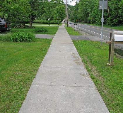 Moderate High # of Curb Cuts: 5 Residential 0 Non-residential Density of Curb Cuts: 51 per mile Notes: This segment of sidewalk ends mid-block across from the library.