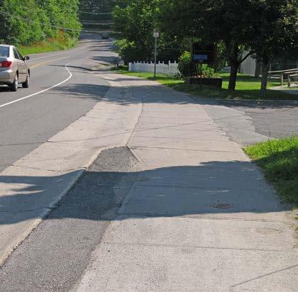 Moderate High # of Curb Cuts: 2 Residential 5 Non-residential Density of Curb Cuts: 42 per mile Notes: The crosswalks at the River St intersection are in poor condition (see intersection assessment).