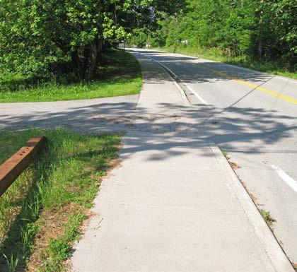Moderate High # of Curb Cuts: 7 Residential 0 Non-residential Density of Curb Cuts: 39 per mile Notes: Recommendations: There is some deterioration of the sidewalk near the intersection with Maple St