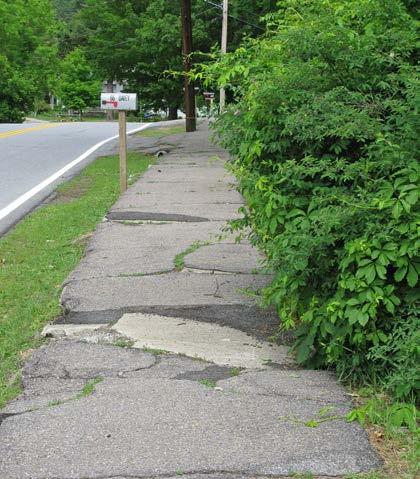 of Curb Cuts: 3 Residential 0 Non-residential Density of Curb Cuts: 26 per mile Notes: Recommendations: The original concrete sidewalk in this segment was paved over with asphalt when it was in need