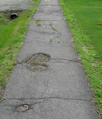 Traffic Level: Low Moderate High # of Curb Cuts: 2 Residential 0 Non-residential Density of Curb Cuts: 47 per mile Notes: This section of asphalt sidewalk is showing signs of