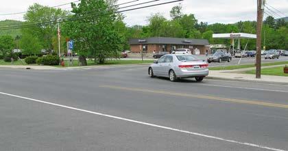 Looking across Park Street from county complex towards park Recommendations: Short-term actions should include repainting the existing crosswalk, adding crosswalks across Court Street at each side of