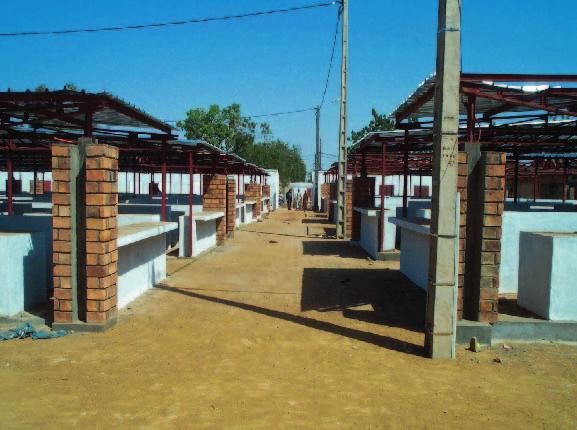 camions sous douane de 4 200 m² ; une Aire de stationnement de 1 180 m² et divers équipements. RÉPUBLIQUE DU MALI Réhabilitation d équipements marchands et d infrastructures urbaines.