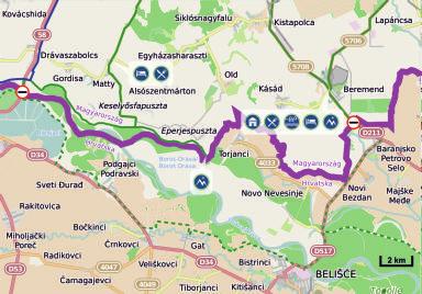 Staza je cijelom dužinom asfaltirana i dijelom je brdskog, a dijelom nizinskog karaktera, prometno je nisko frekventna te prolazi kroz ili pored naselja: Villány, Kisjakabfalva, Kisbudmér, Bóly,