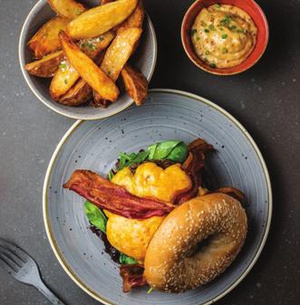 Bagel Burger, smoked cheddar, red onion chutney, bacon, mayo, triple fried potato cloves