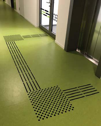 Braille is also designed according to DIN 32986 and consists of combinations of embossed points in a grid.