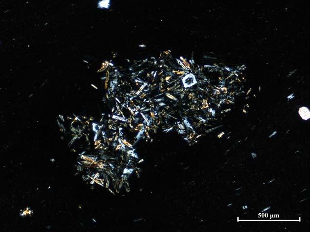 The texture of the rock abounds in microlithes (crystallites), surrounding spectacularly the phenocrysts grouped frequently in aggregates (Figs. 5-6.). Torn inclusions of plagioclase, monocline pyroxene, amphibole and biotite comprise maximally 5-10 volume% (Fig.