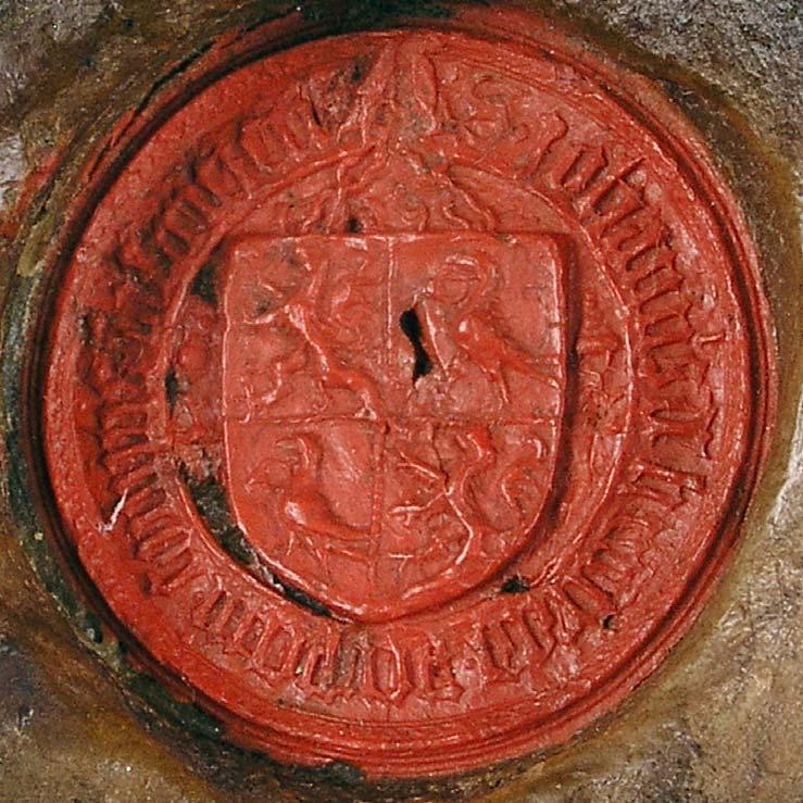 62 NOVÁK ÁDÁM 4. Hunyadi János Beszterce grófjának pecsétje 1456-ból A pecsét mezejében címerpajzs. Az 1. és 4. negyedében jobbra ágaskodó oroszlán. A 2. és 3.