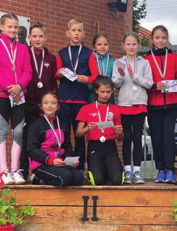 ezüstérmes, míg 100 m-es síkfutásban, 11,97-es egyéni csúccsal ért a célba.