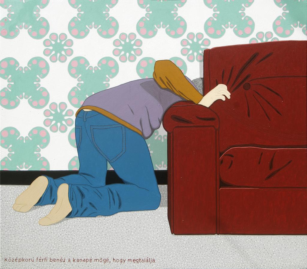 Middle aged man is looks behind the couch to