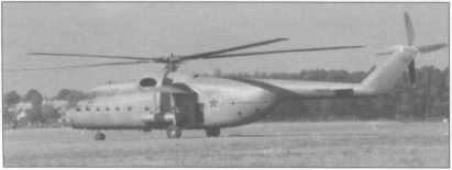 Budaörs with open engine bays and a cockpit photo Mi-6A 'piros 79', Budaörs 1989. A jobb oldalon a kabin fotója látszik Mi-8T yellow Ol of396.
