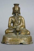 51. Rishi Illesztett öntőformázással készített, réz Laosz (?) Mag.: 19 cm 52. Csónak talapzaton ülő Buddha (17. sz.