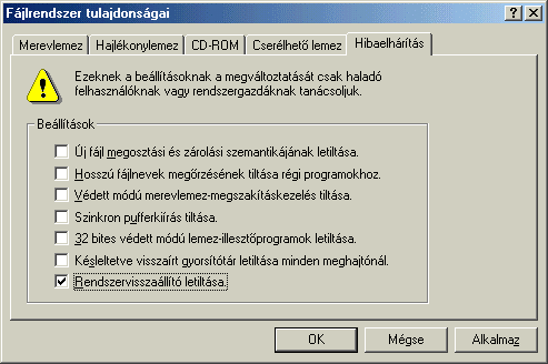 A Teljesítmény fülön található Fájlrendszer gombra kattintva nyissa meg a Fájlrendszer tulajdonságai ablakot. A Rendszervisszaállító letiltása opciót pipálja be.