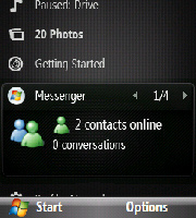 Nyomja meg a bal vagy jobb gombot a Windows Live Messenger, Windows Live Mail, és a Szinkr. státusz közötti átváltáshoz.