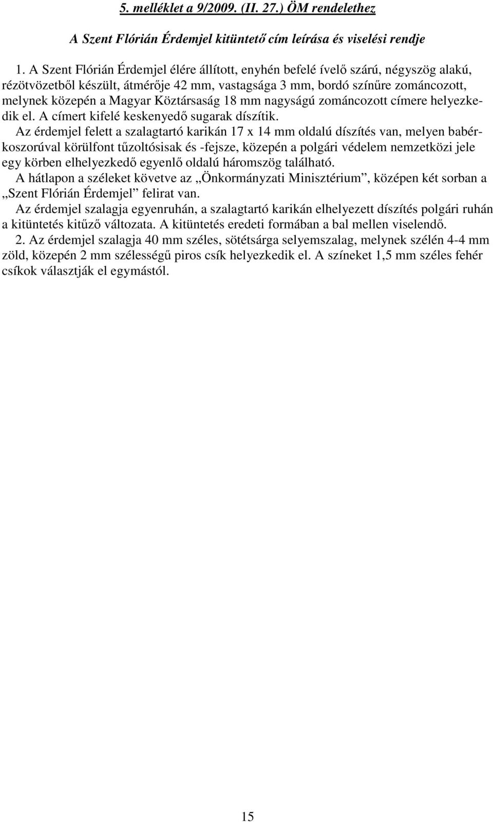 18 mm nagyságú zománcozott címere helyezkedik el. A címert kifelé keskenyed sugarak díszítik.