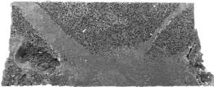 (a) (b) 200 μm (c) 2 mm 2 mm (d) 48. ábra - H/D=1 karcsúságú Al-SLG szintaktikus fémhab próbatest károsodása.