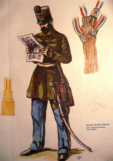 4. Csizma A tisztek felül ívelten kivágott magyar csizmát viseltek, a galambkosár színe fekete és nincs a sorgyalogosi sárga színű szalag sem rajta.