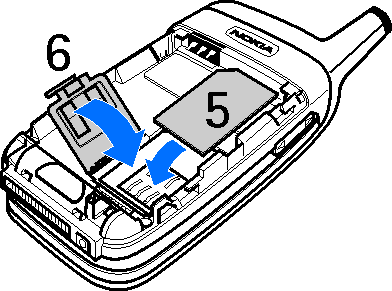 Helyezzük be a SIM-kártyát (5). Ügyeljünk a megfelelõ behelyezésre.