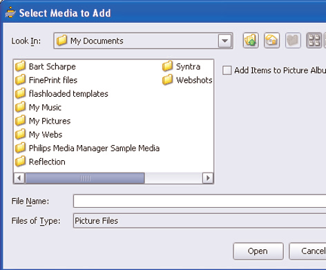 Válassza ki az Add Music, Add Pictures vagy Add Movies. Kattintson az Add Files or Folders... (fájl vagy mappa hozzáadása...) utasításra.