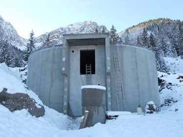 SW Erfolgsprojekt WASSERNUTZUNG TWS, Heiterwang Der Trinkwasserspeicher in Heiterwang in Tirol konnte trotz seiner imposanten Abmessungen von 11 x