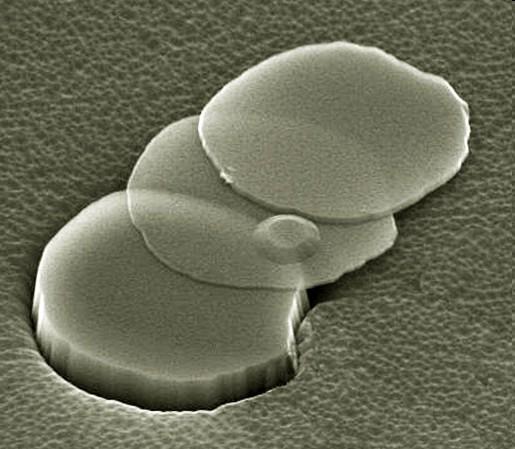 Scanning electron micrograph (SEM) of a fallen mesa of graphite.
