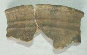 60. Vas tronconic. Biborþeni, comuna Biborþeni, jud. Covasna, Dealul cu cioturi. Lut, pietricele. H: 9,5 cm; DG: 13 cm; DB: 9,3 cm. Eneolitic; Cultura Bodrogkeresztúr.